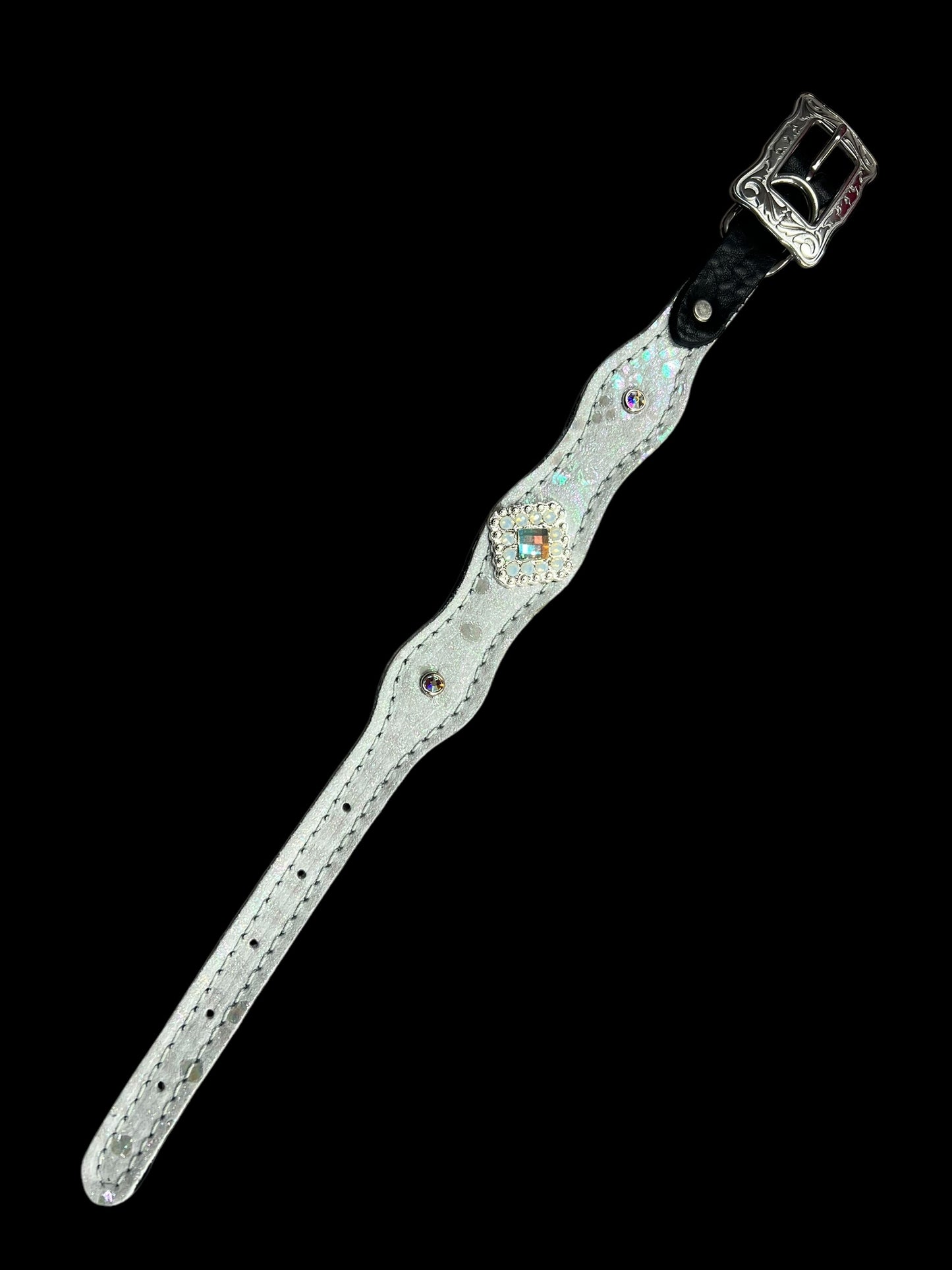 White mystic on dark leather