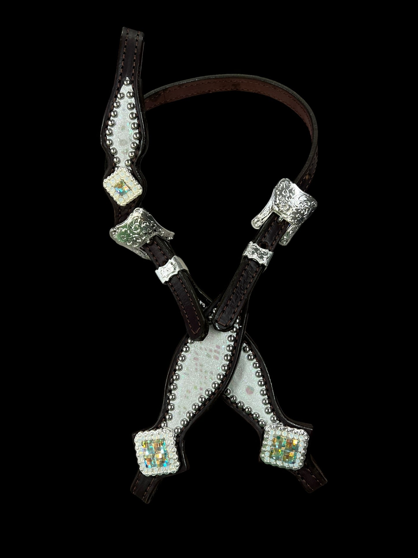 White mystic on dark leather