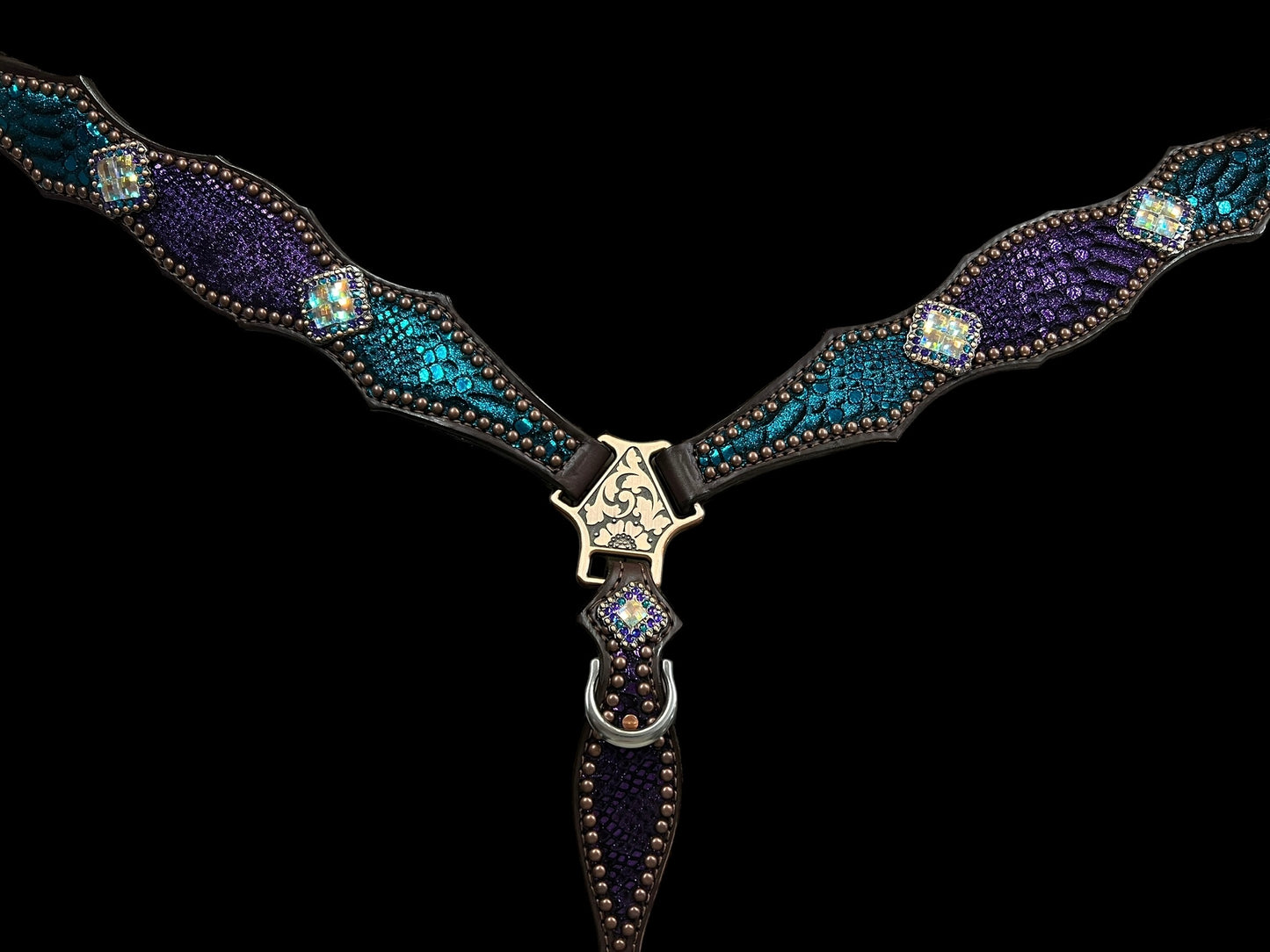 Teal and purple mystic on dark leather