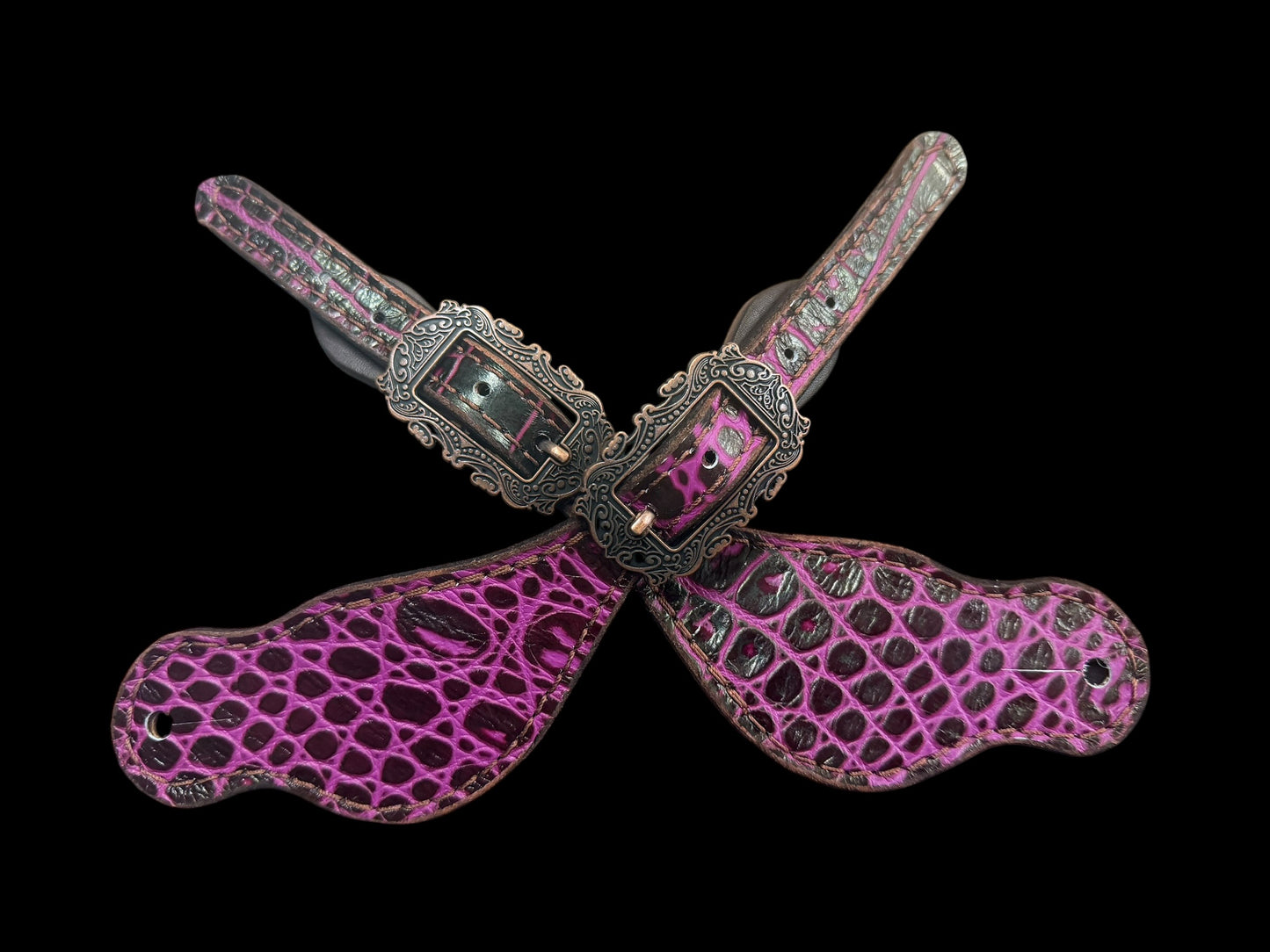 Fuchsia gator on dark leather