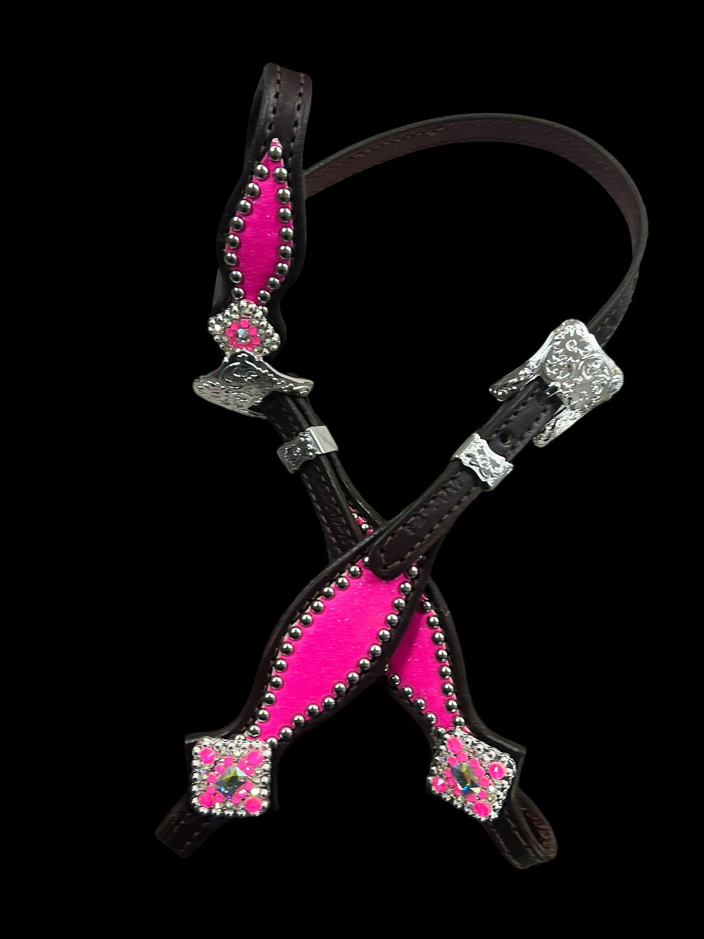 Hot pink glitter on dark leather