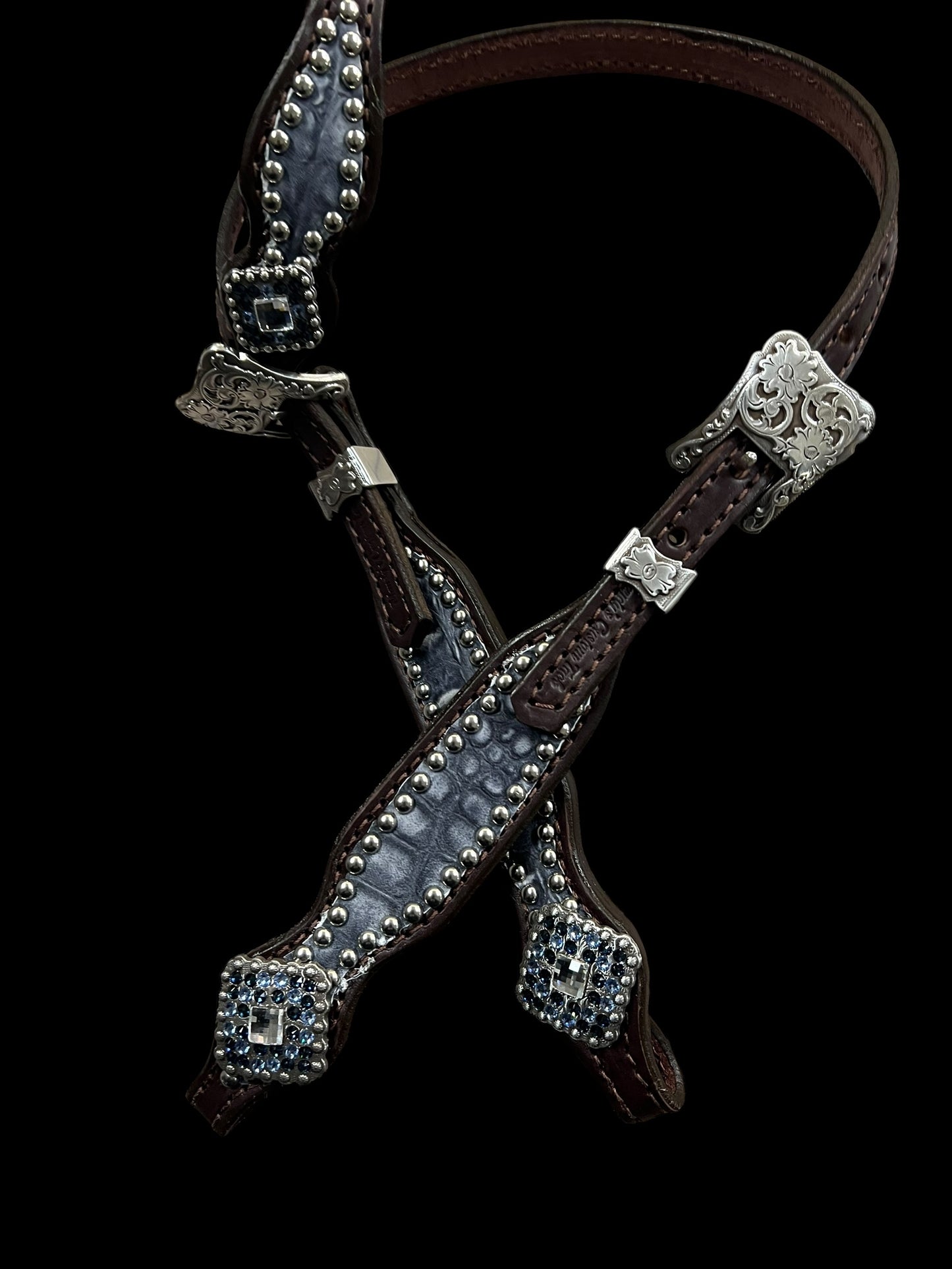 Denim blue gator on dark leather