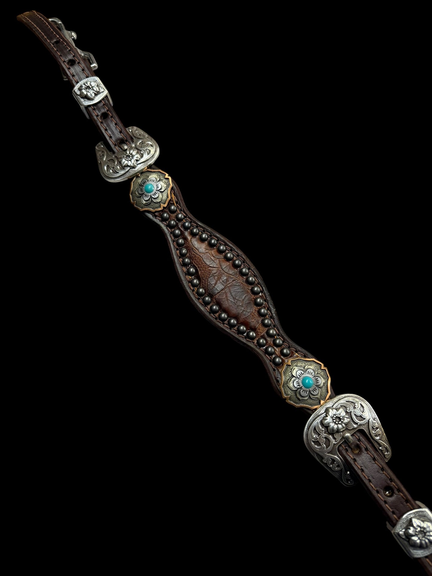 Brown floral on dark leather
