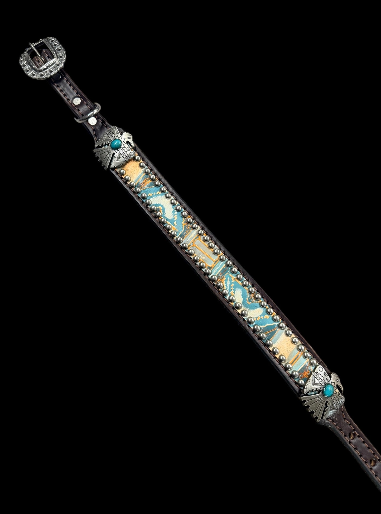 Orange and turquoise navajo on dark leather