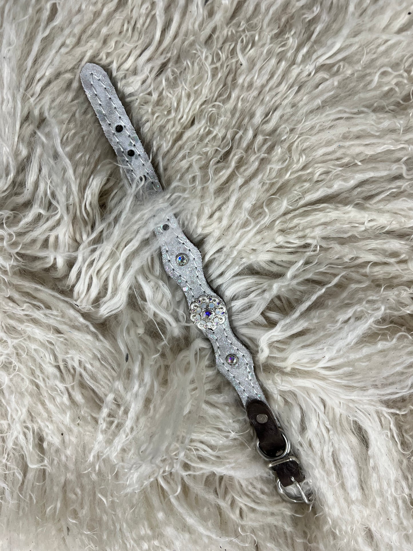 White mystic on dark leather