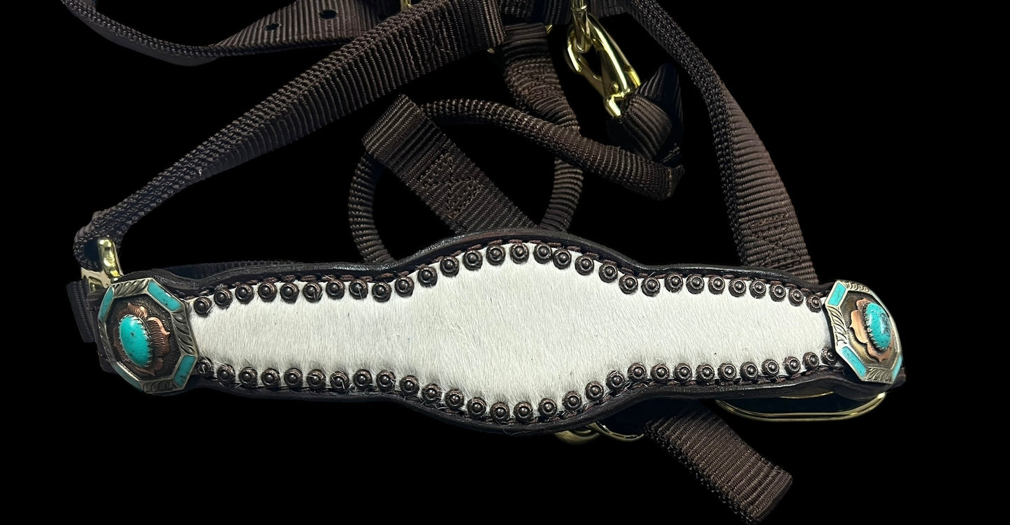 White and grey brindle cowhide on dark leather