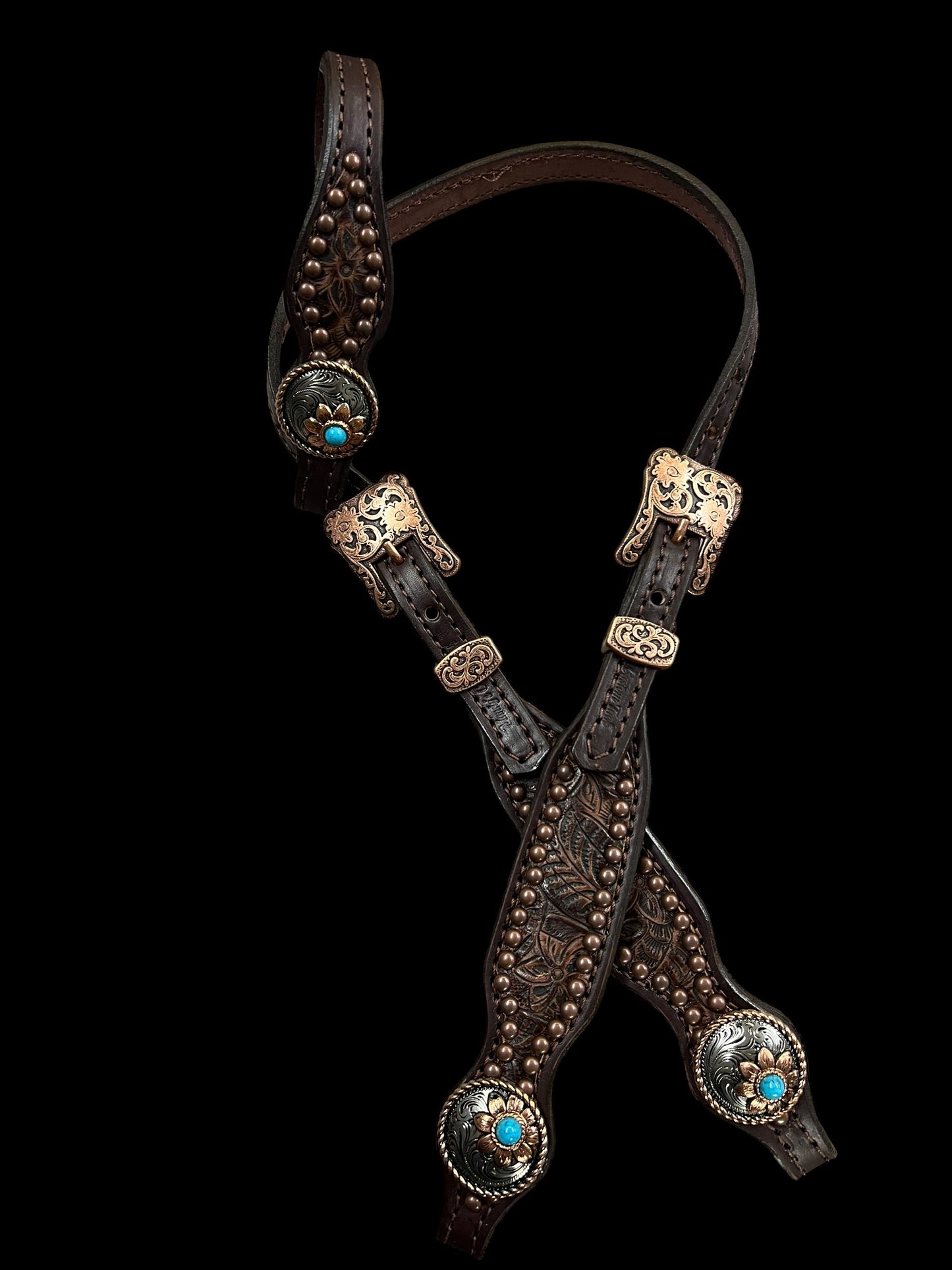 Brown floral on dark leather
