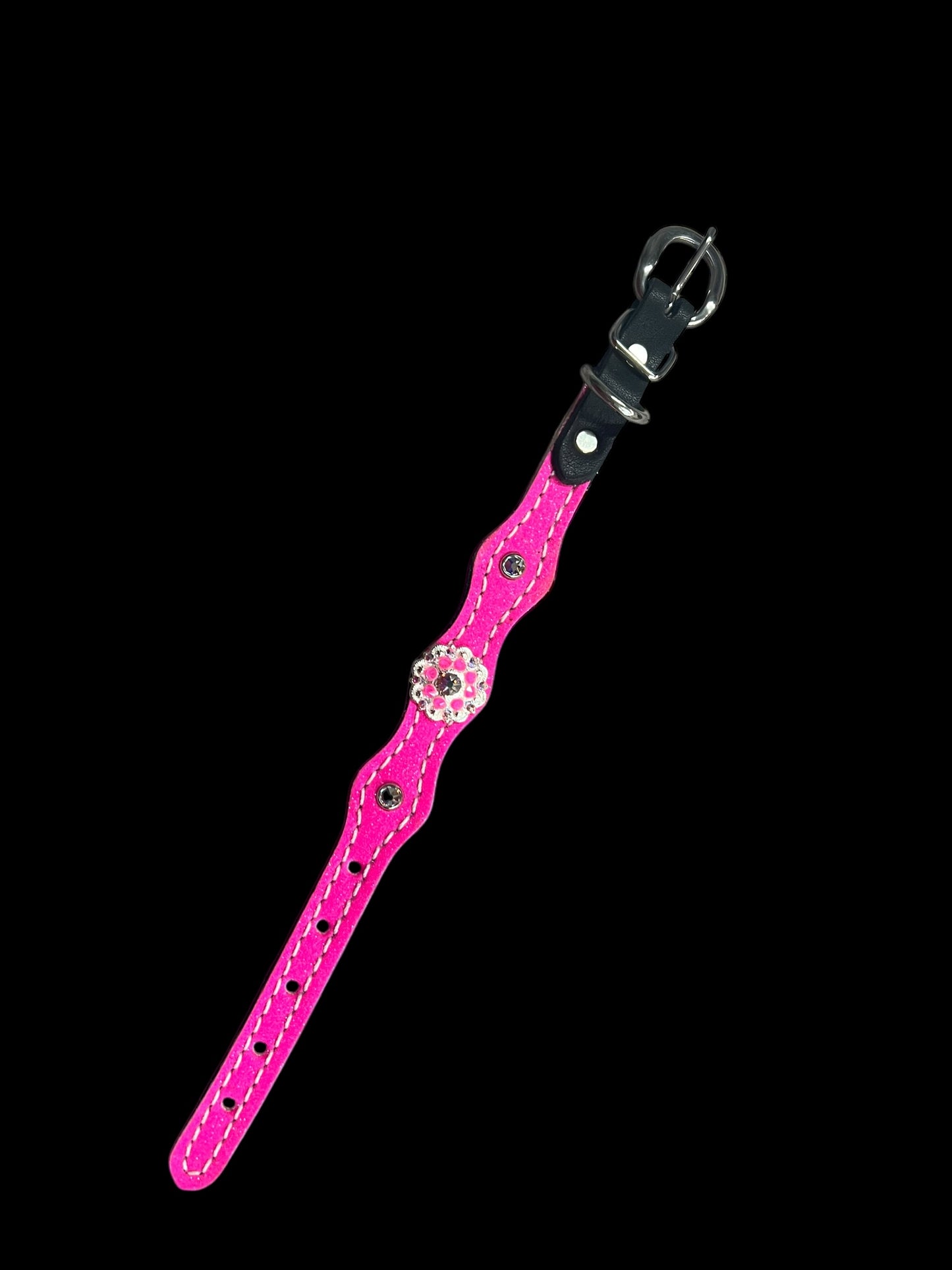 Hot pink glitter on dark leather