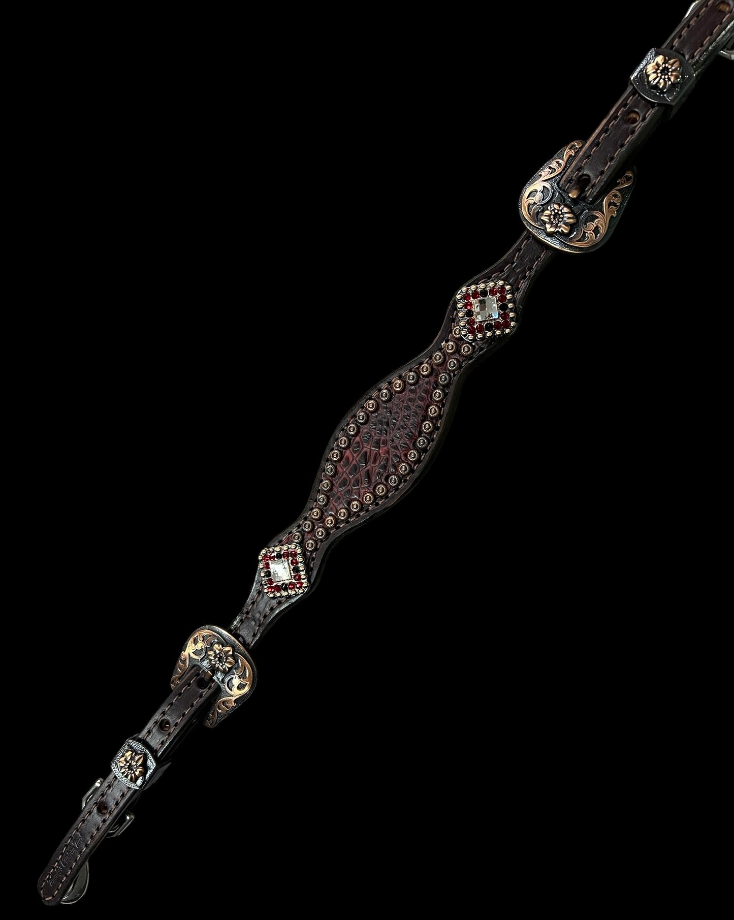 Dark red gator on dark leather