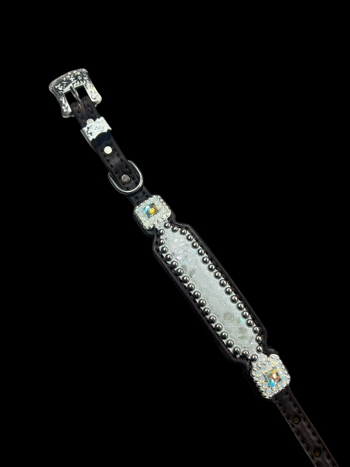 White mystic on dark leather