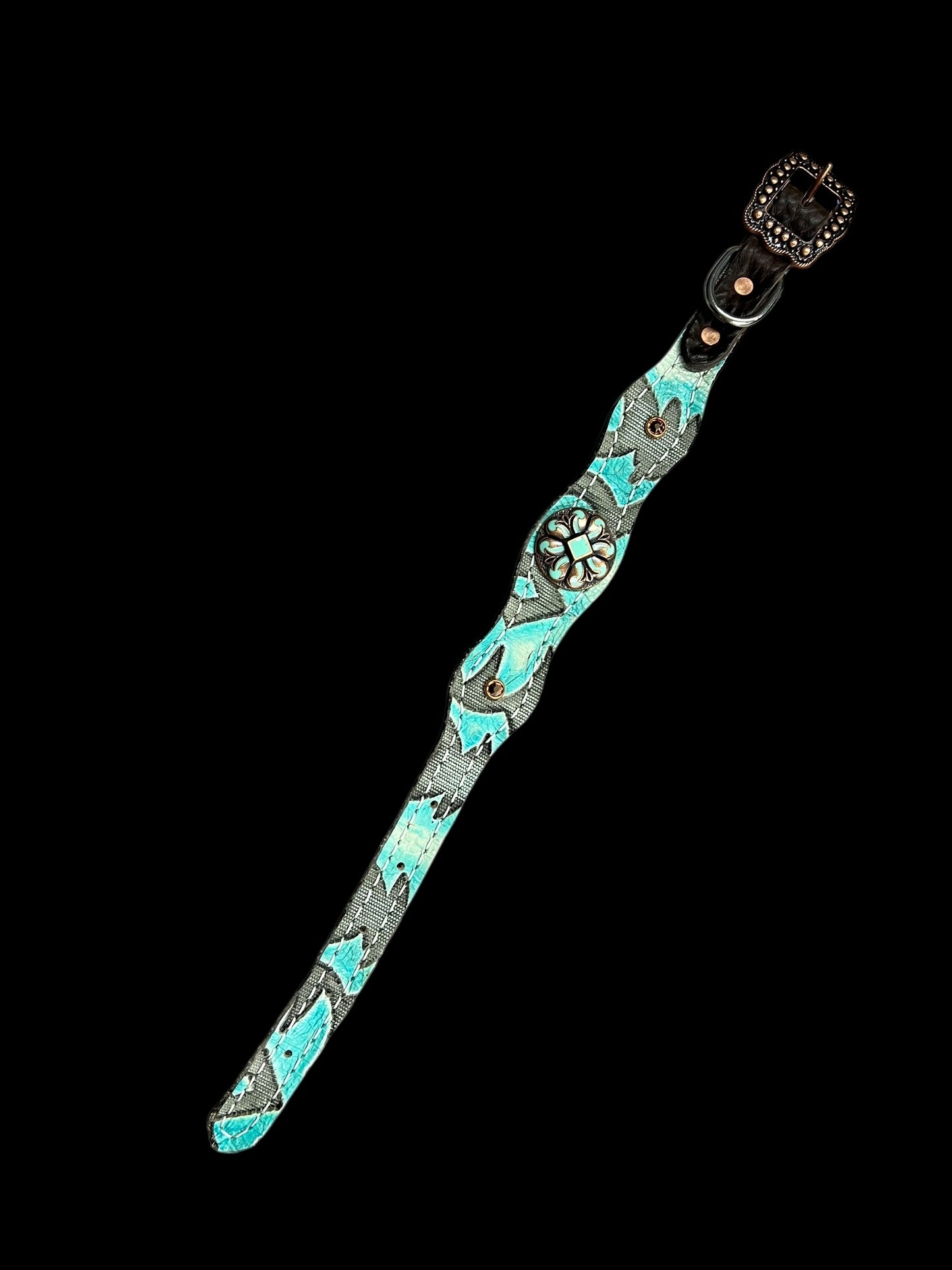 Light turquoise Laredo on dark leather