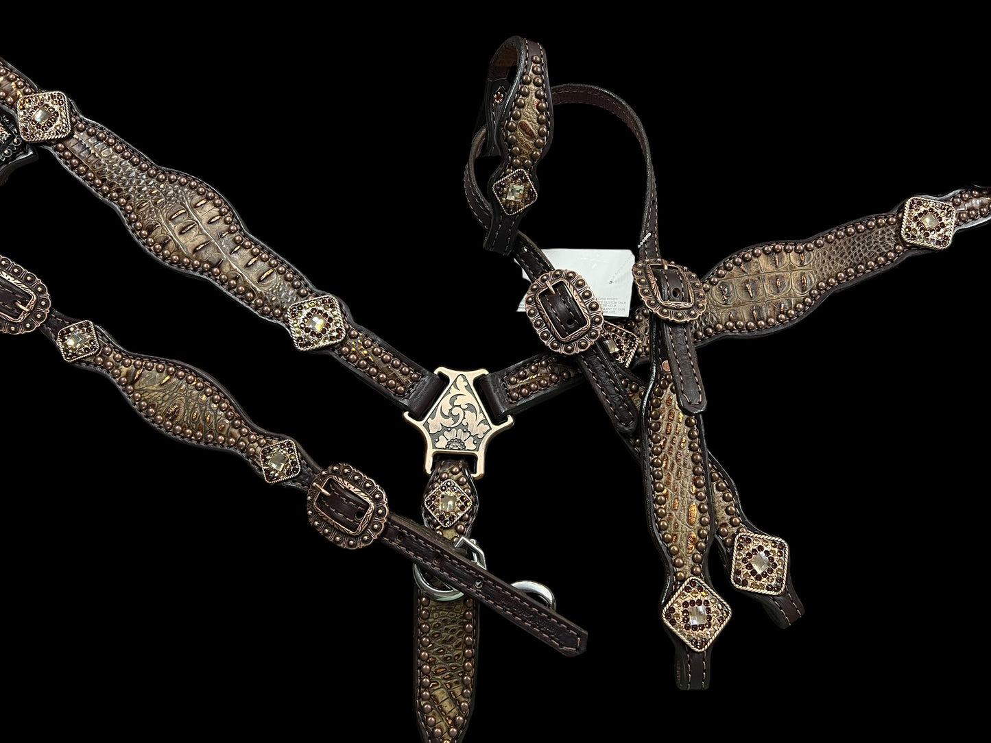 Copper gator on dark leather