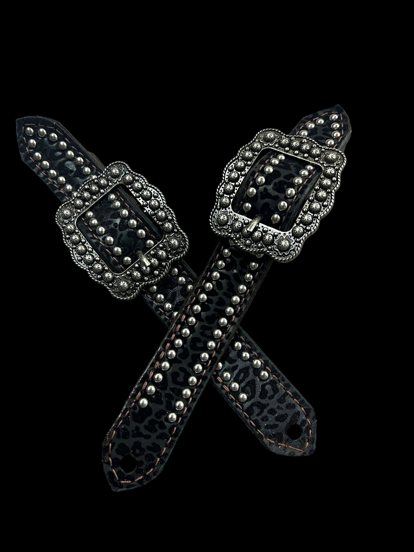 Black flocked leopard on dark leather