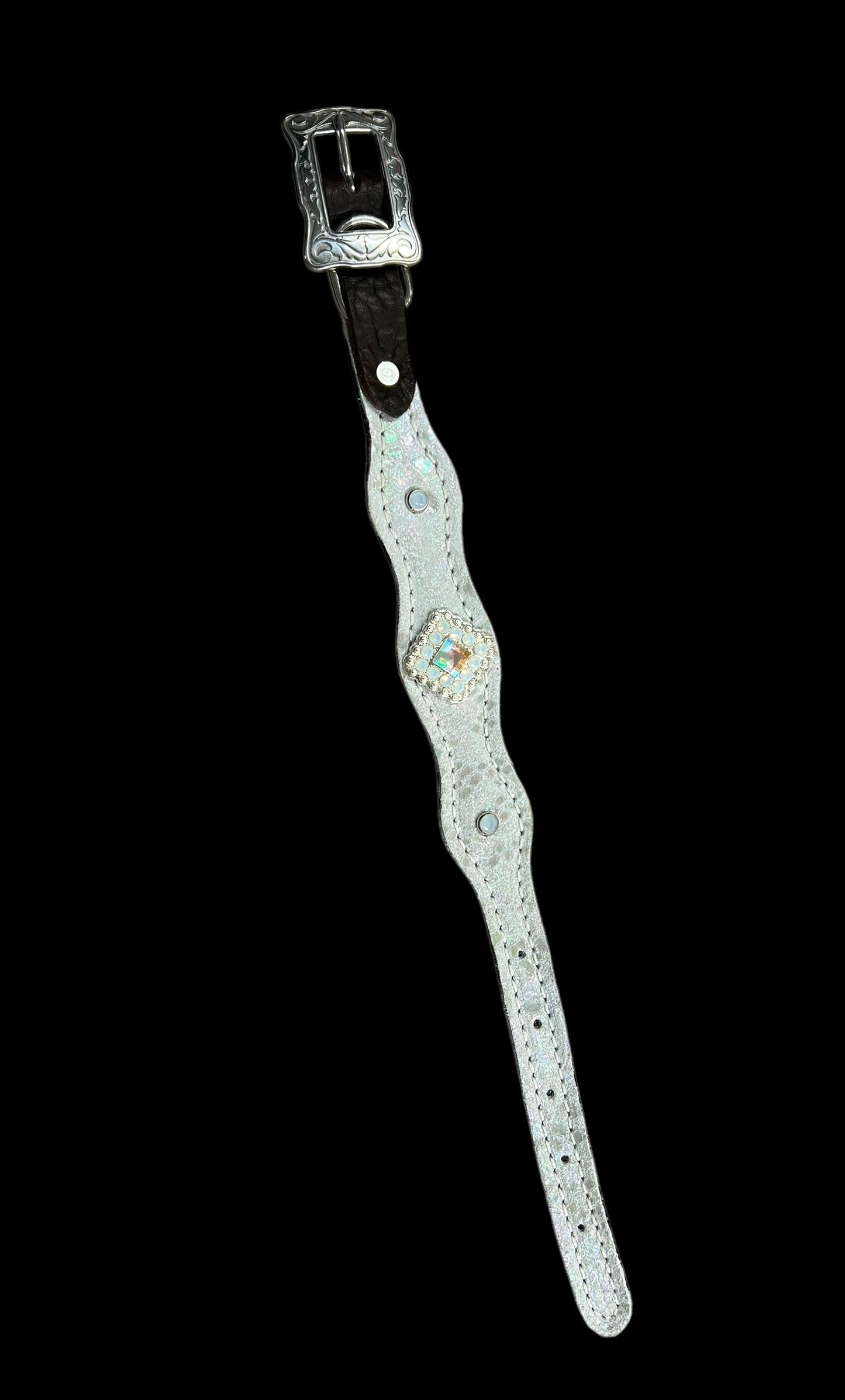 White mystic on dark leather