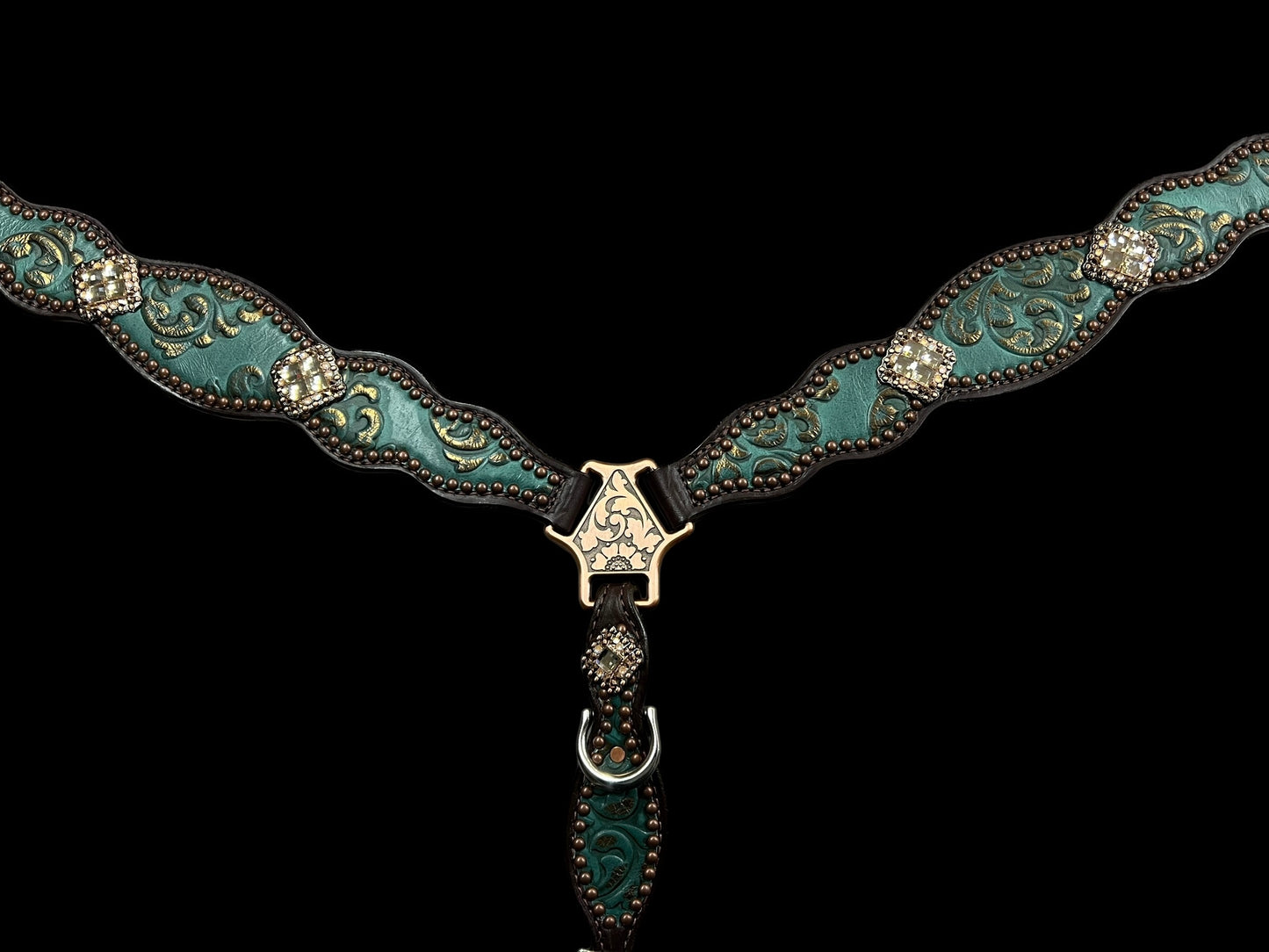 jade and copper on dark leather