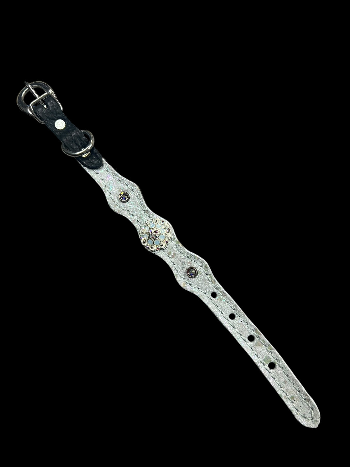 White mystic on dark leather