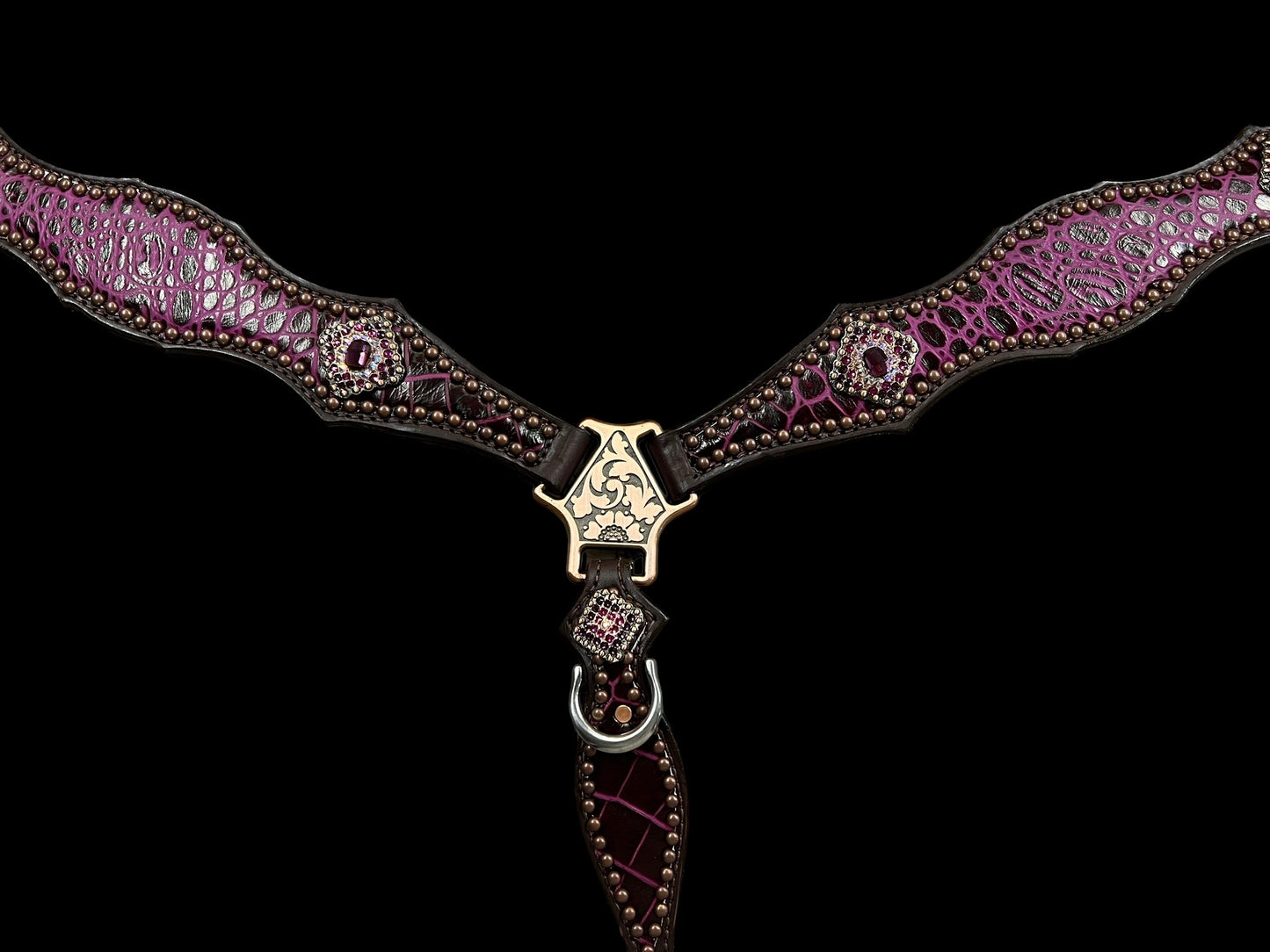 Fuchsia gator on dark leather