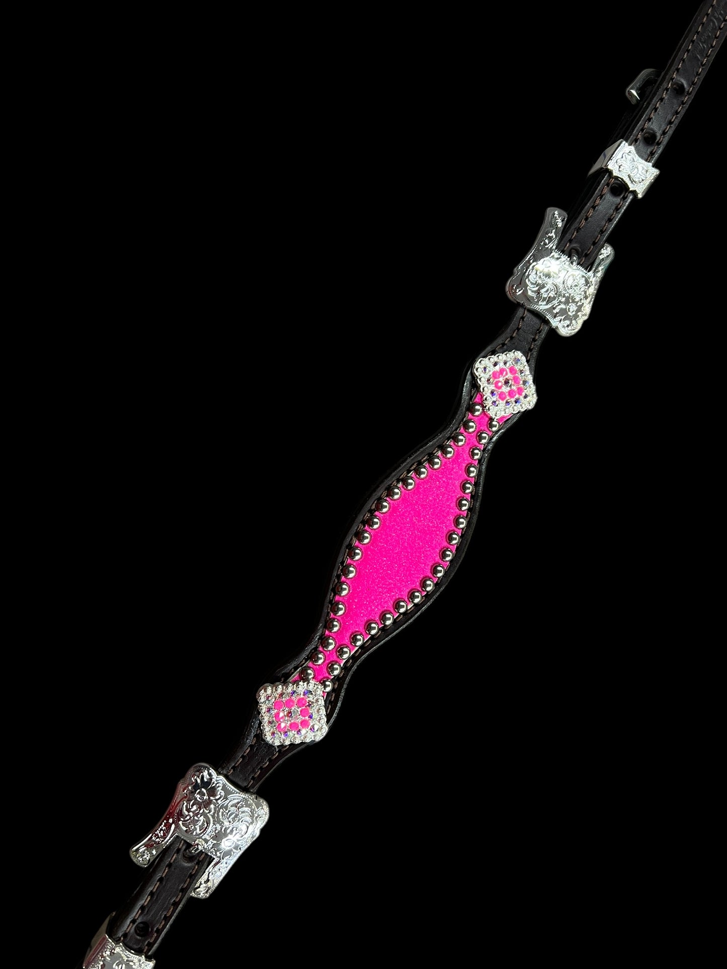 Hot pink glitter on dark leather