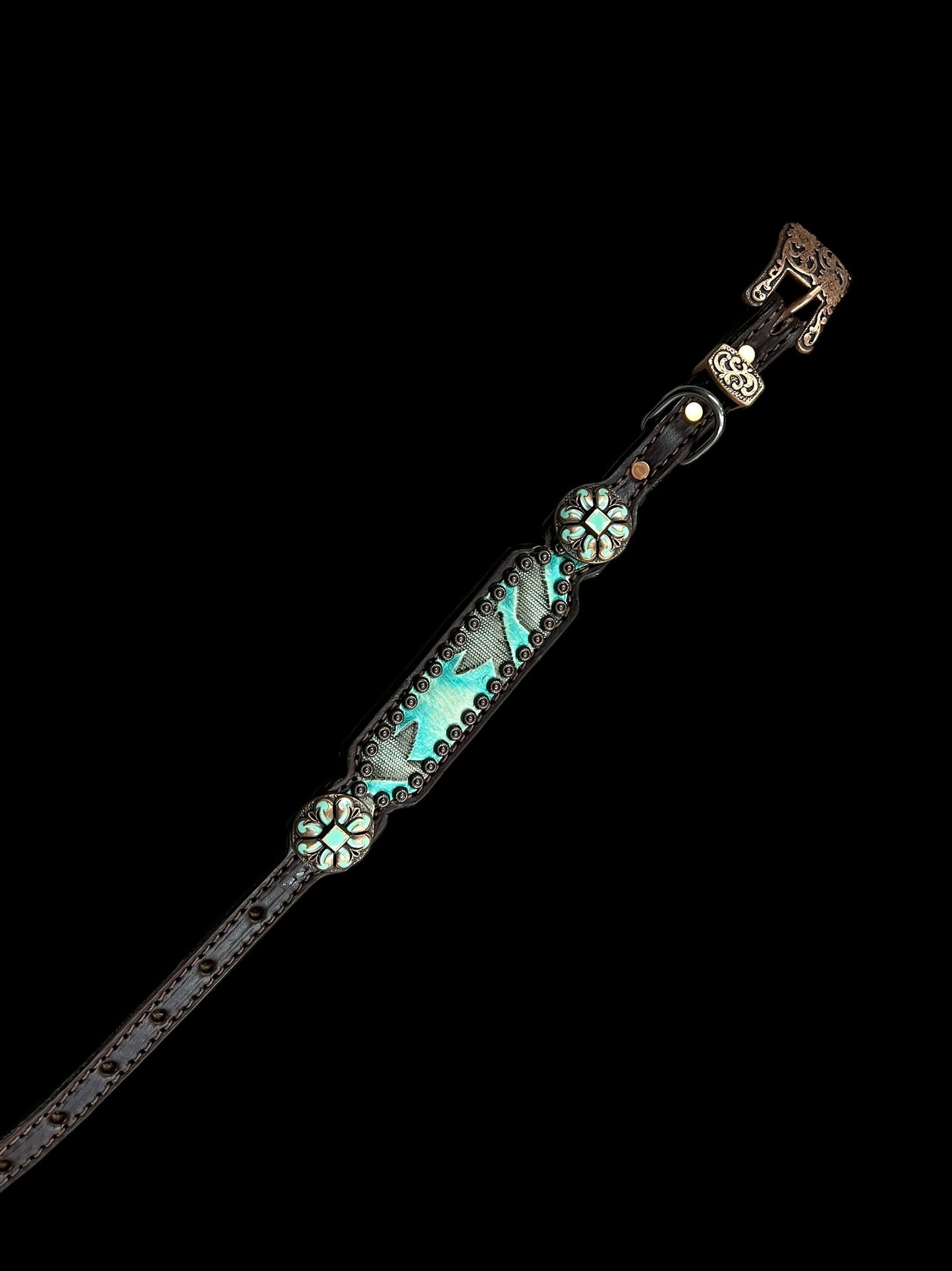 Light turquoise Laredo on dark leather