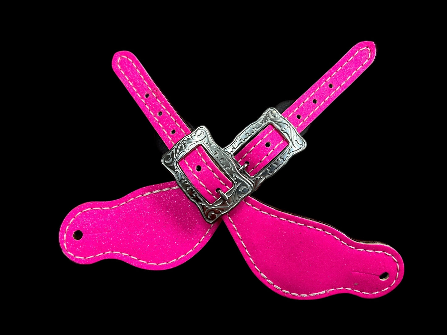 Hot pink glitter on dark leather