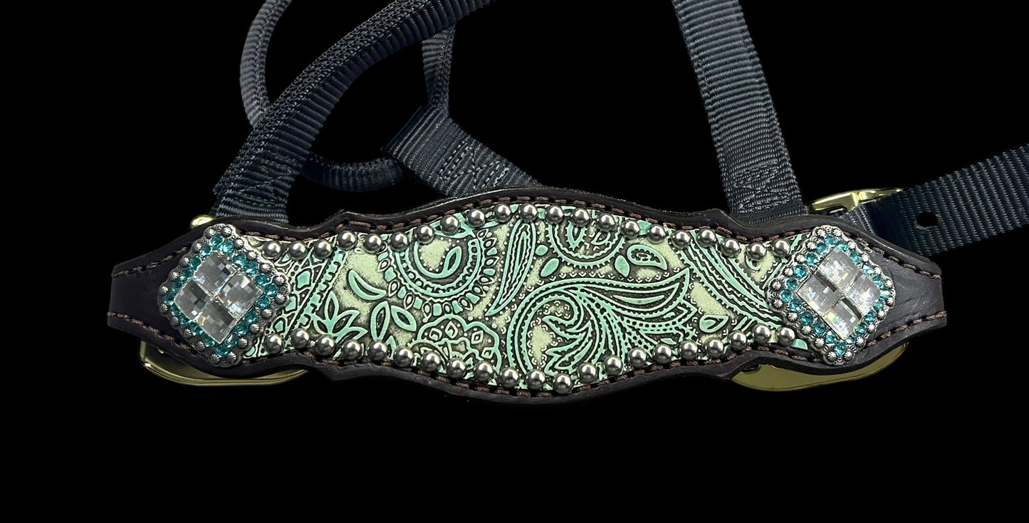 Turquoise and mint paisley on dark leather is