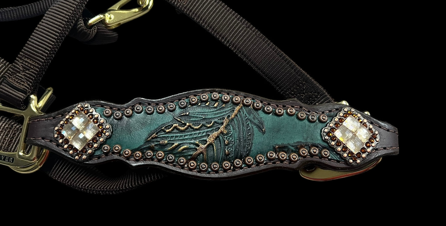 jade feathers on dark leather