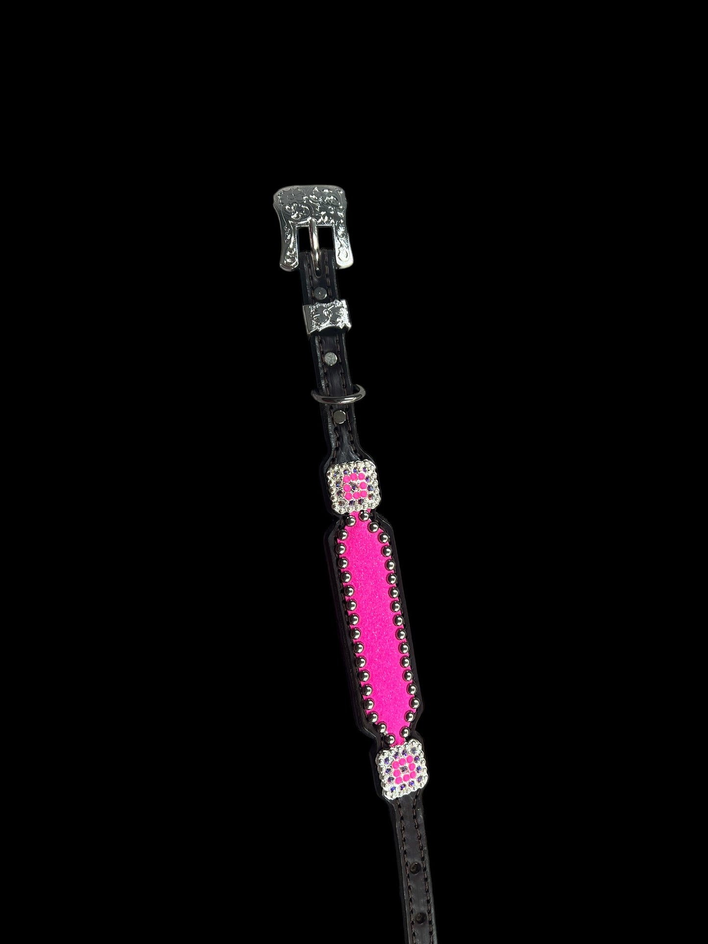 Hot pink glitter on dark leather