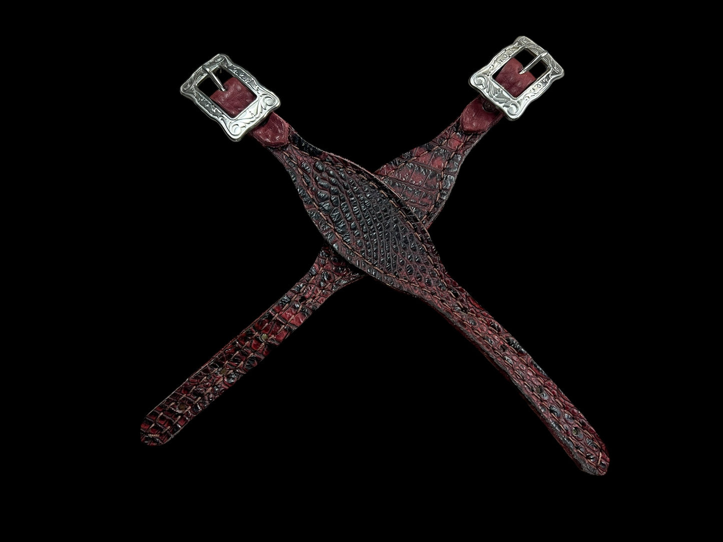 Dark red gator on dark leather