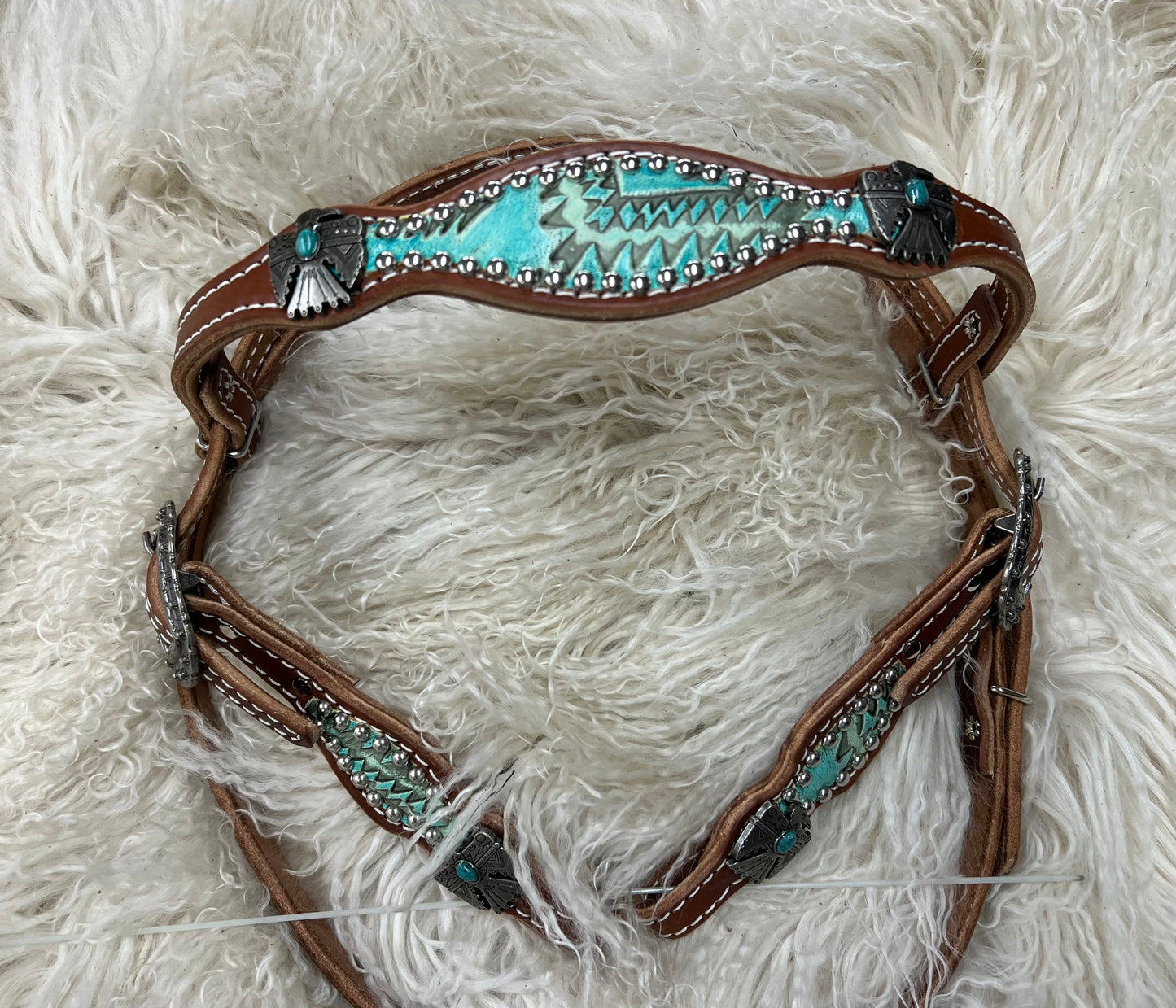 Turquoise aztec on medium leather