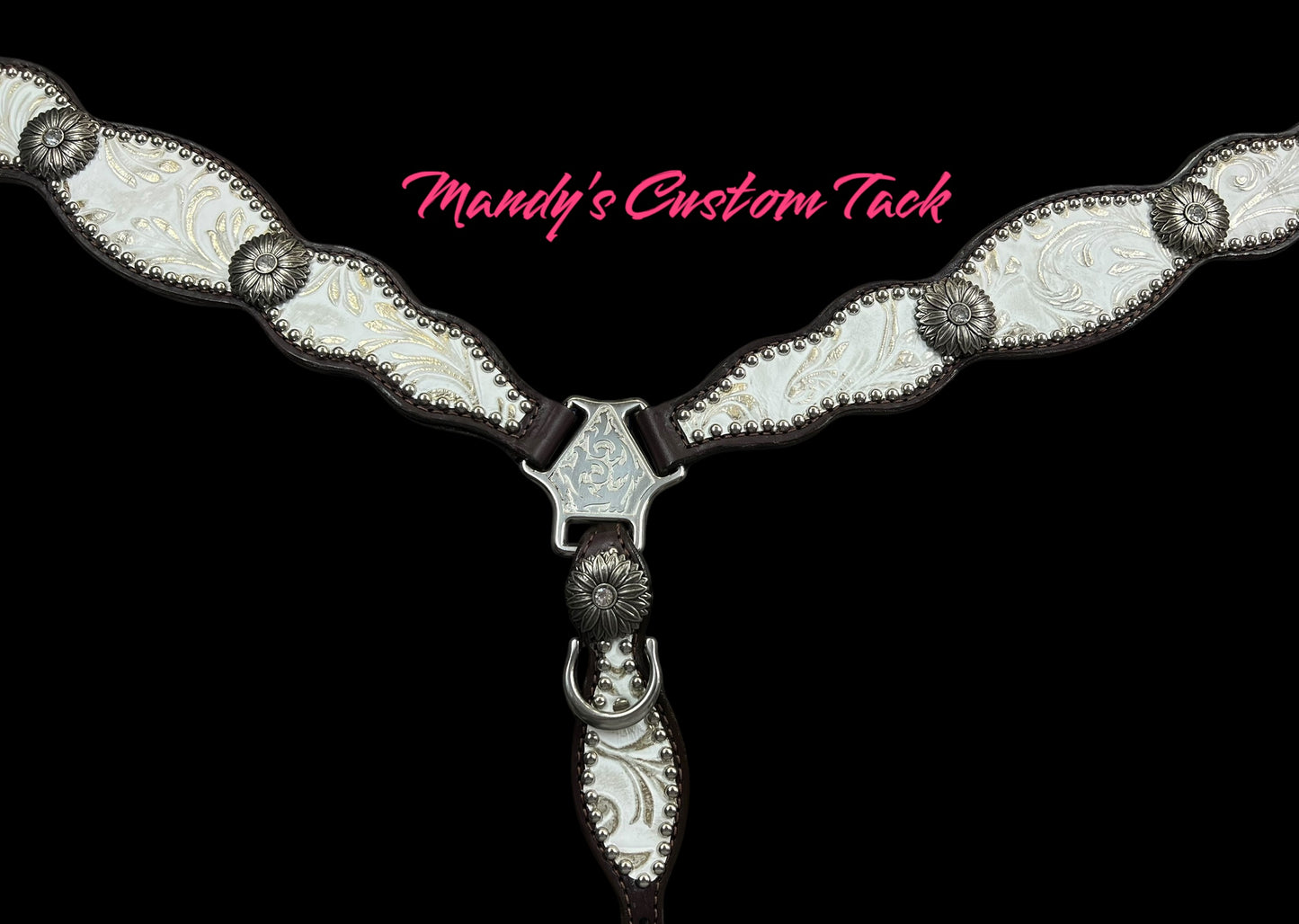 White and silver floral on dark leather