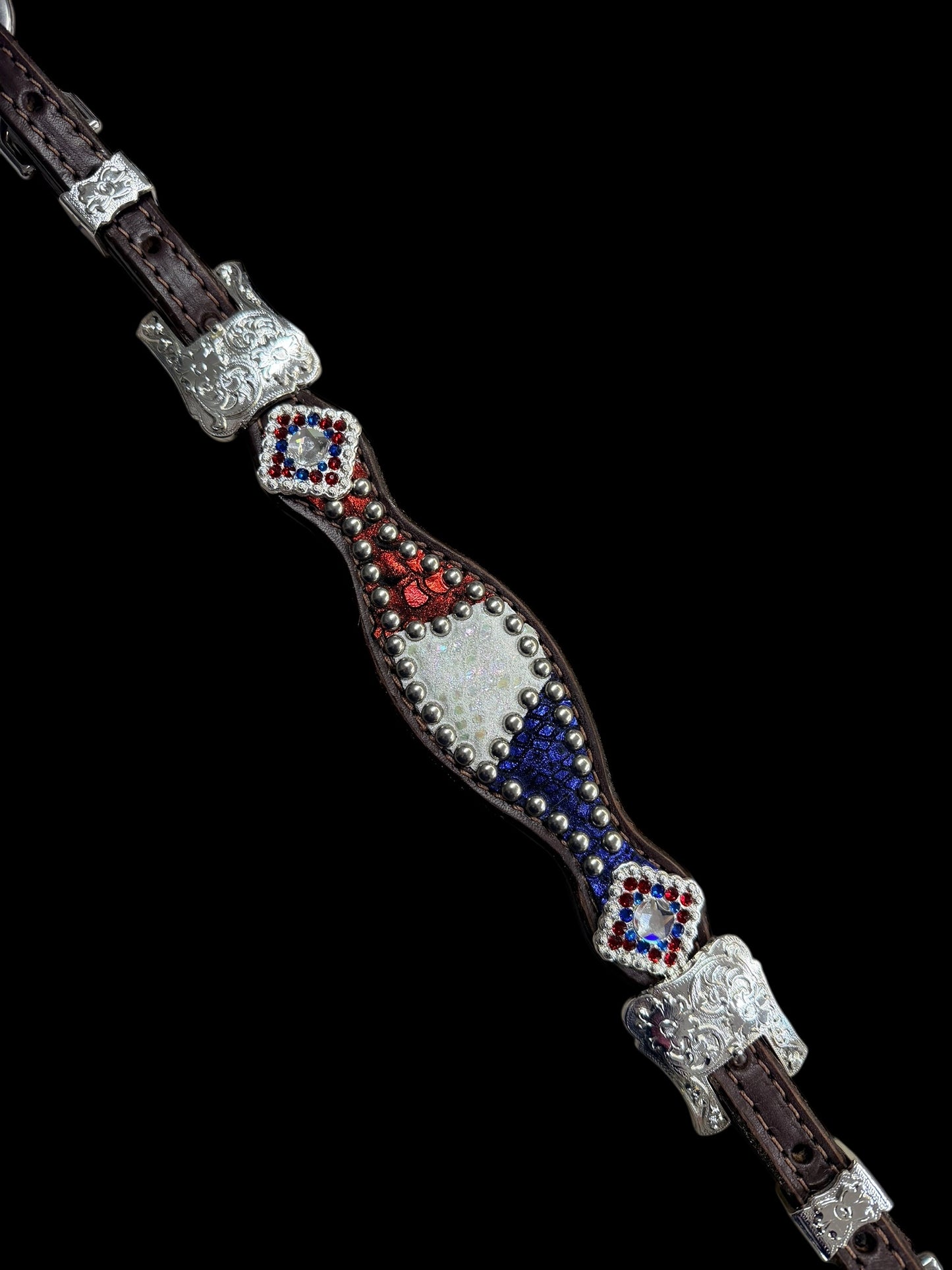 Red, white, and blue mystic on dark