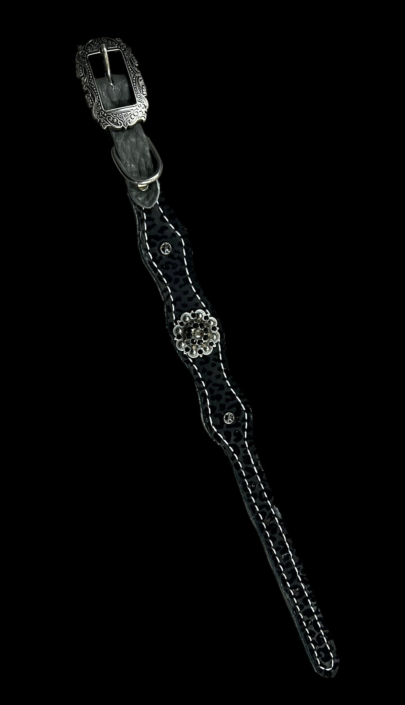 Black flocked leopard on dark leather