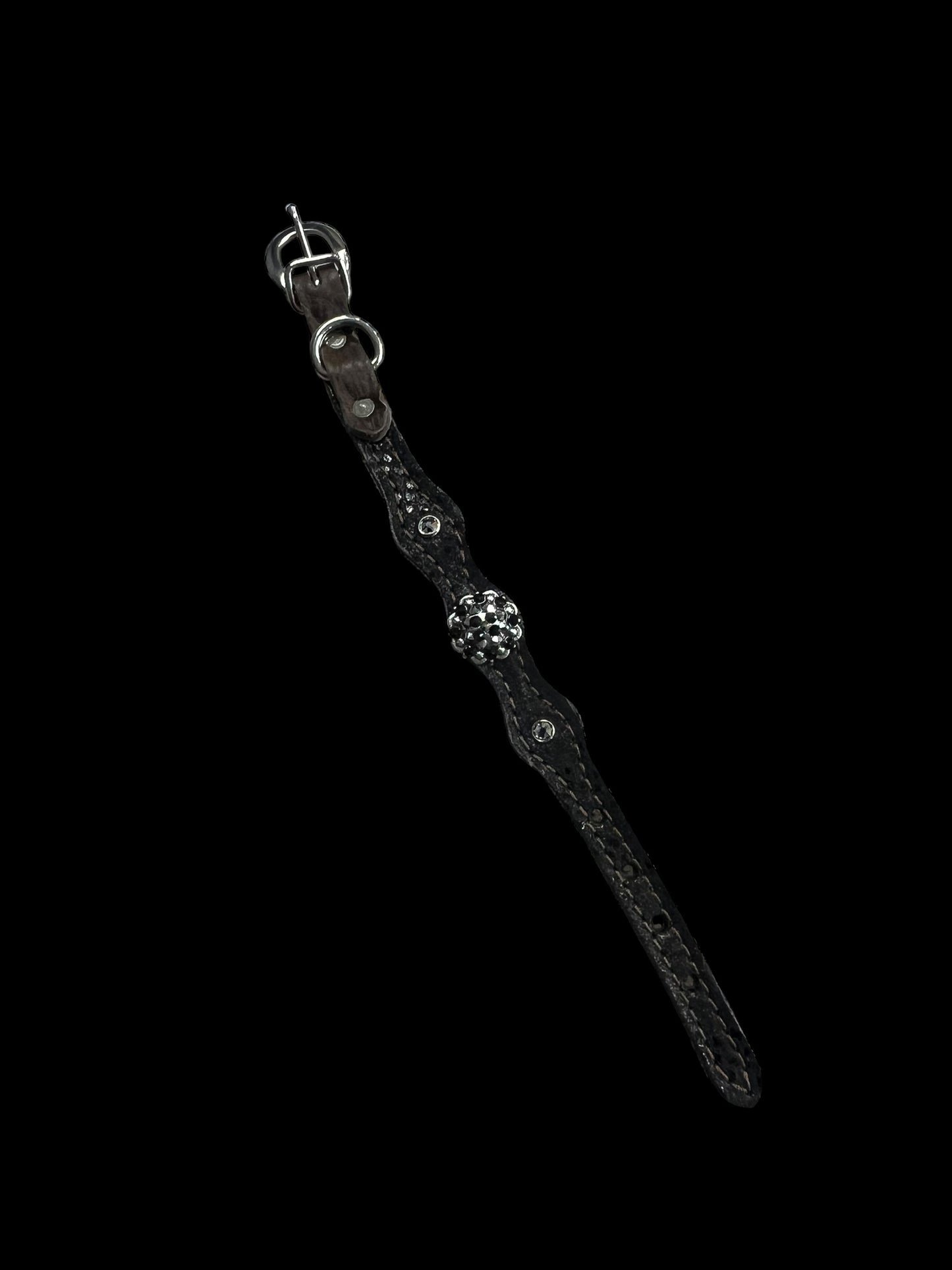 Black flocked leopard on dark leather