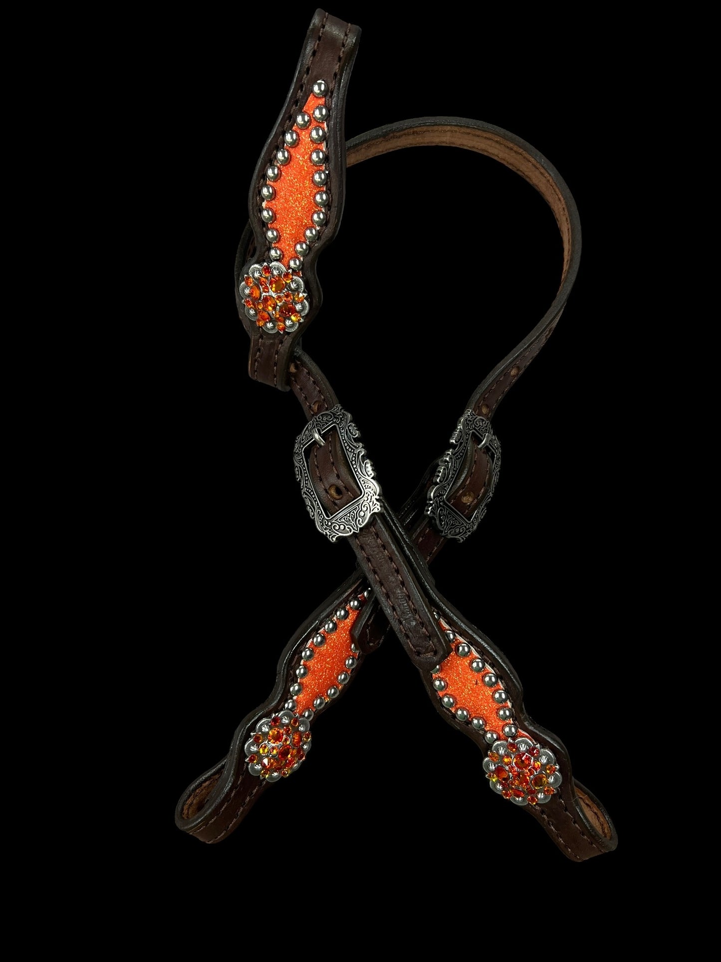 Large pony orange glitter on dark harness leather