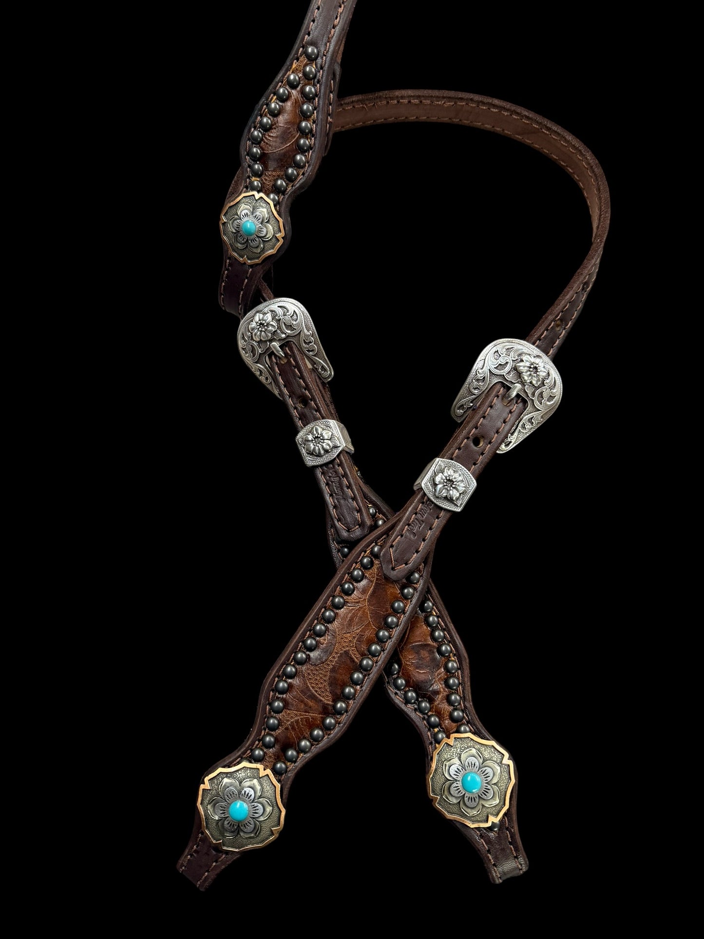 Brown floral on dark leather