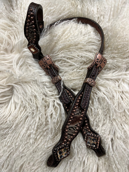 chocolate feathers on dark leather