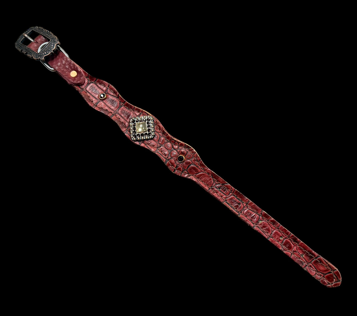 Wine gator on dark leather