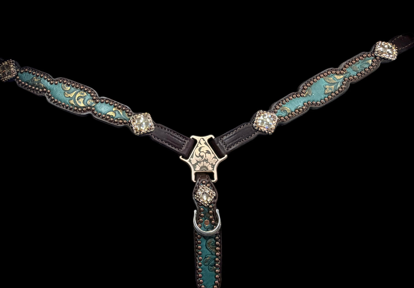 jade and copper on dark leather