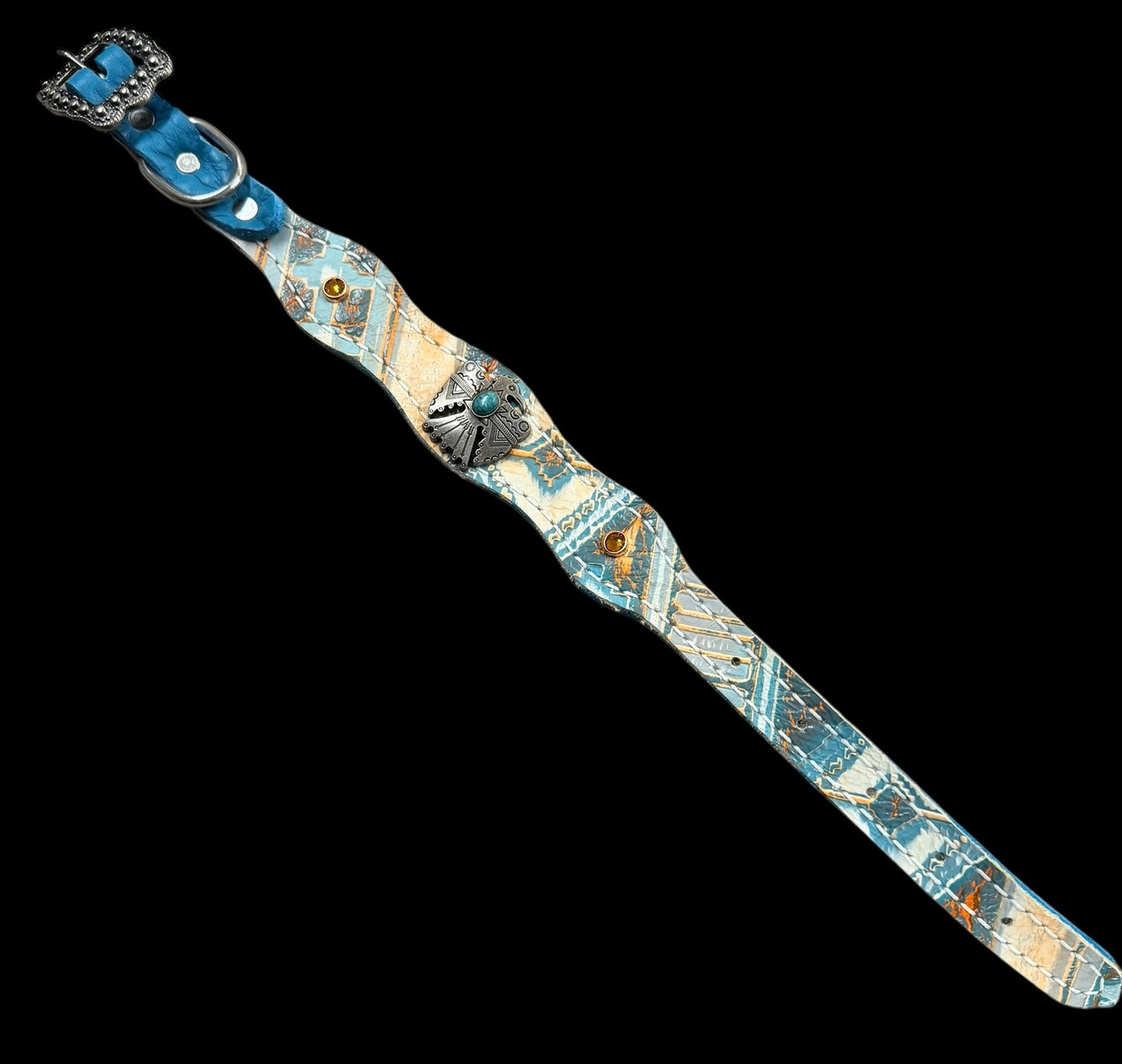 Orange and turquoise navajo on dark leather