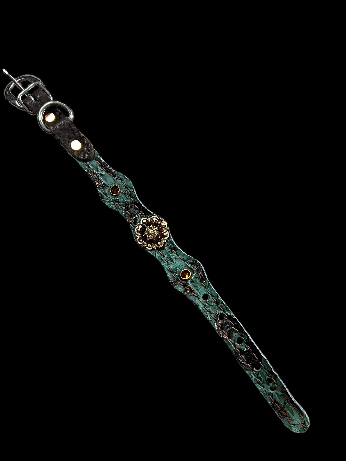 Teal and brown aztec on dark leather