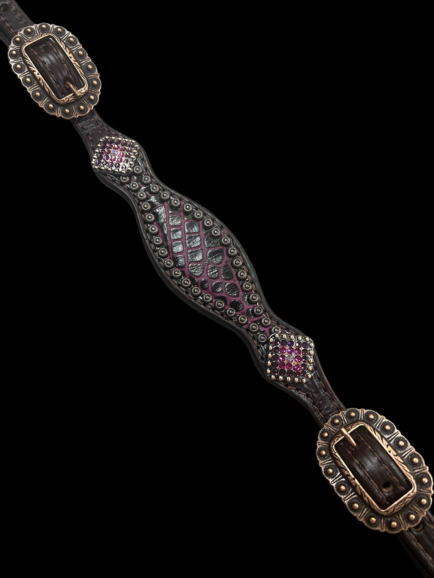 Fuchsia  gator on dark leather