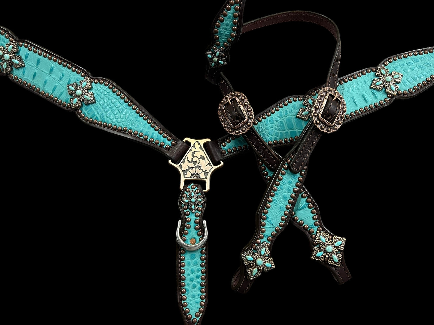 Turquoise gator on dark leather