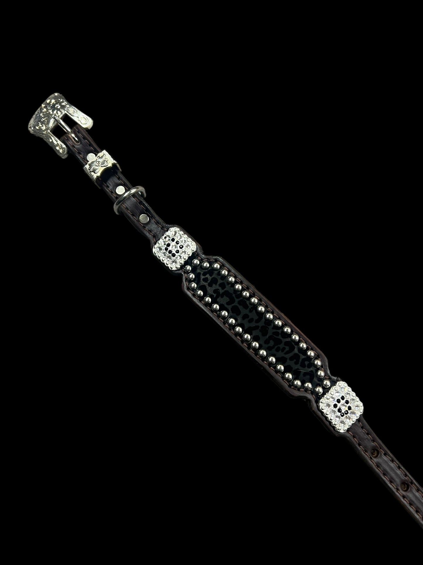 Black flocked leopard on dark leather