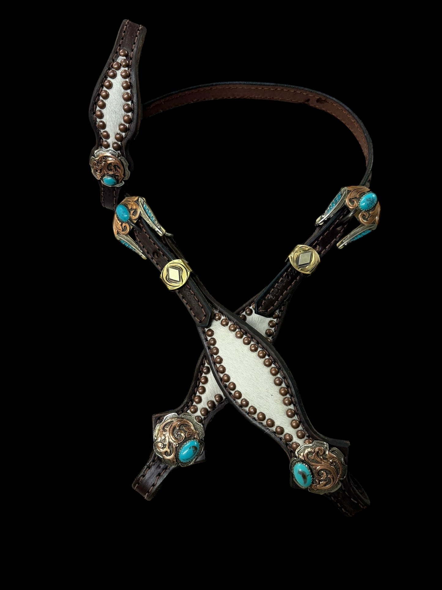 White and grey brindle  cowhide on dark leather