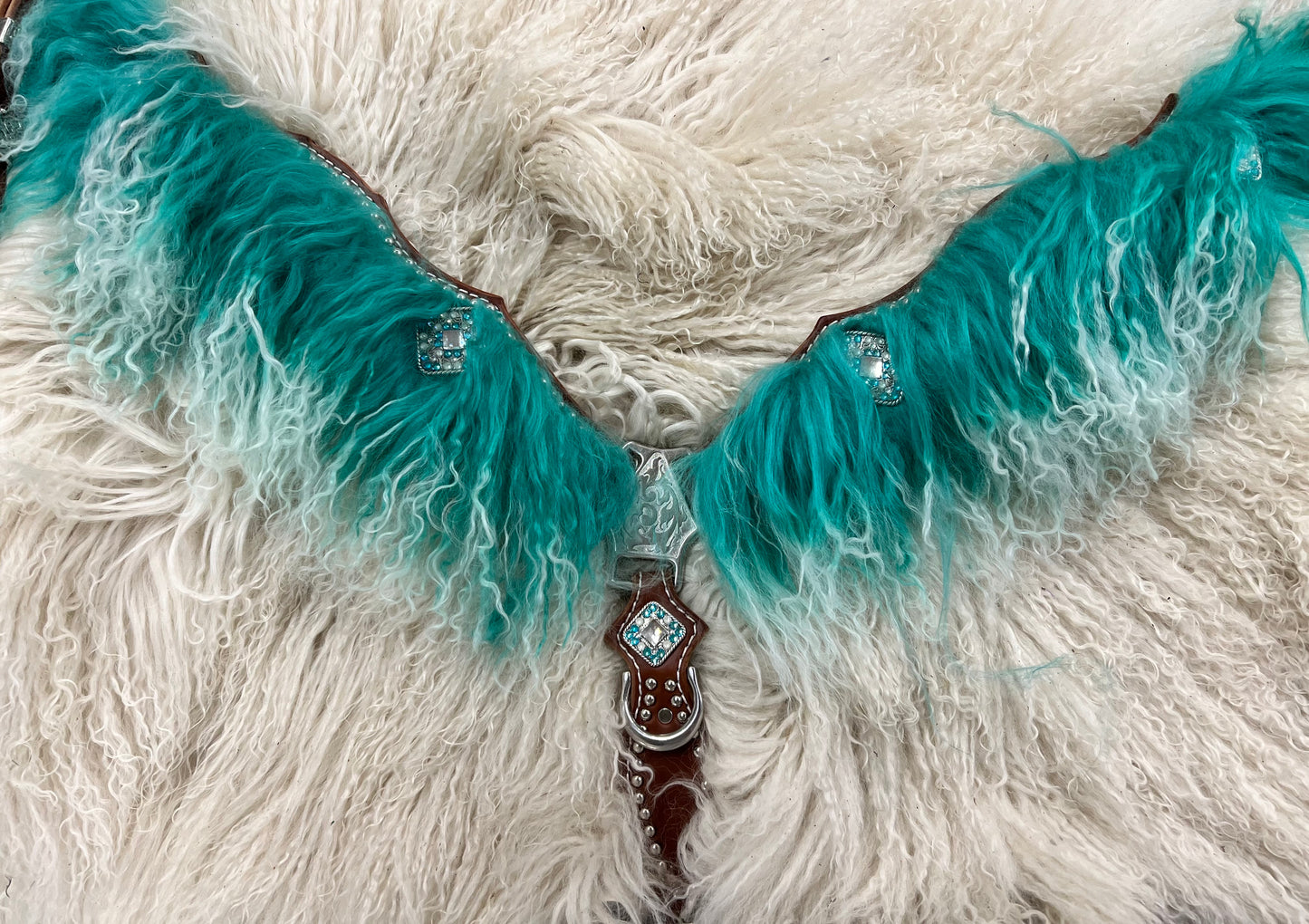 Teal angora on medium leather