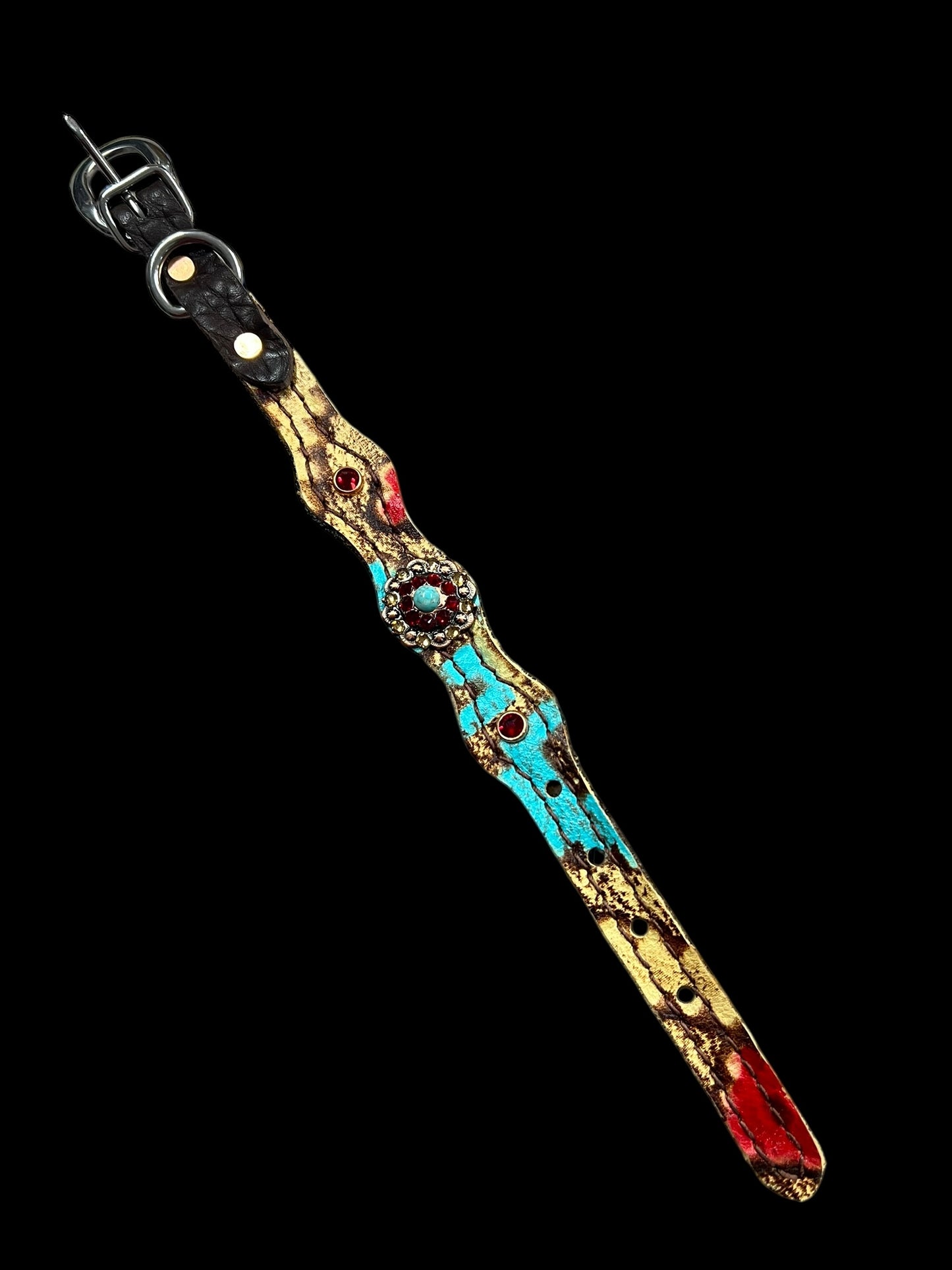 Tan, red, and turquoise Taos on dark leather