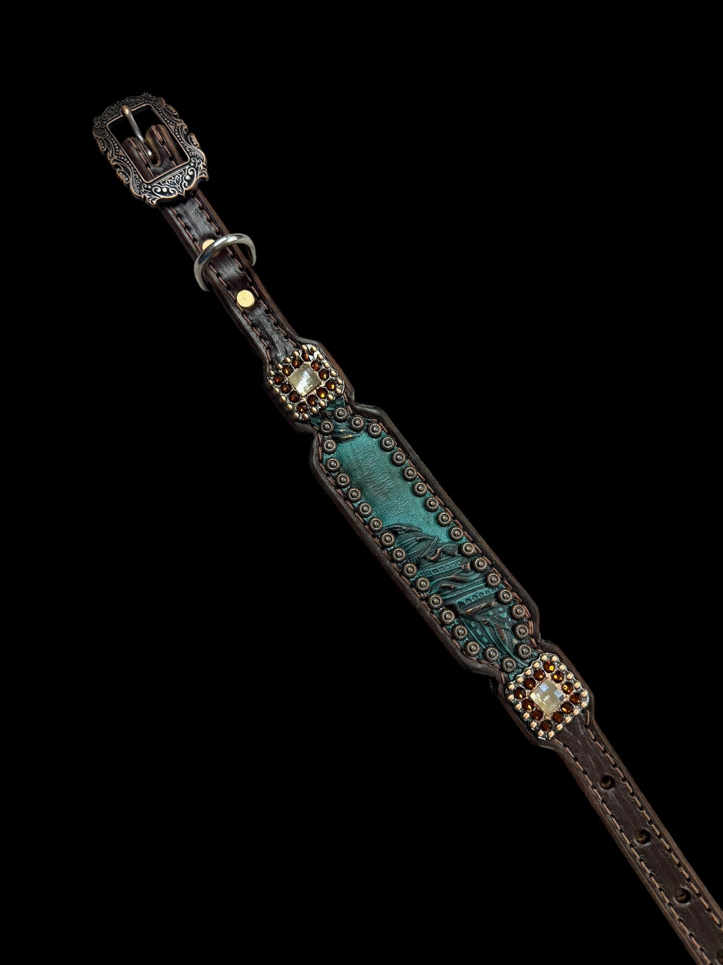 jade feathers on dark leather