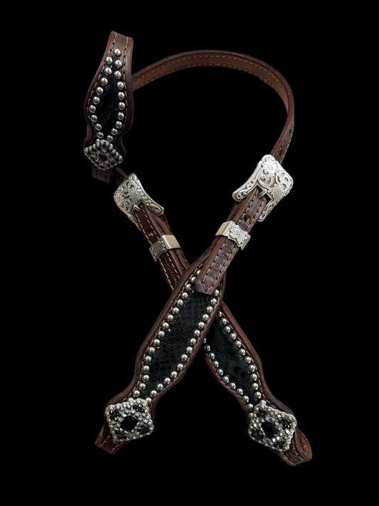 Black mystic on dark leather