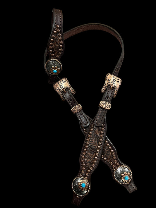 Brown floral on dark leather