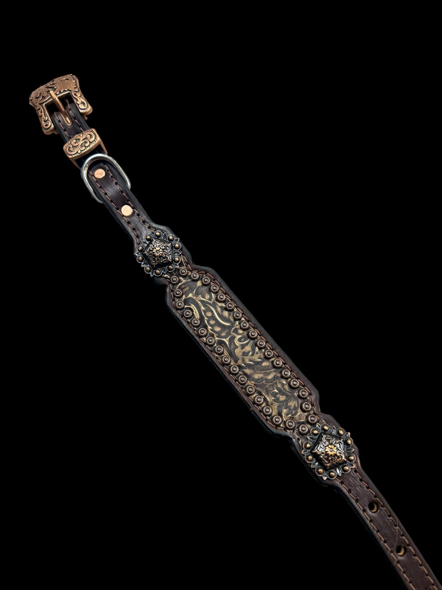 cream and brown daisy on dark leather